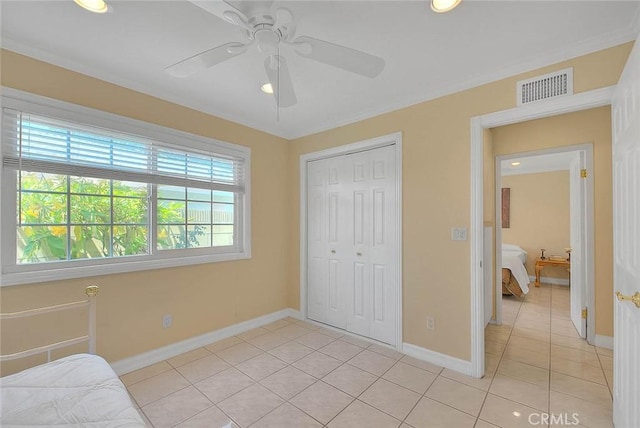 unfurnished bedroom featuring light tile patterned floors, baseboards, a closet, recessed lighting, and ceiling fan
