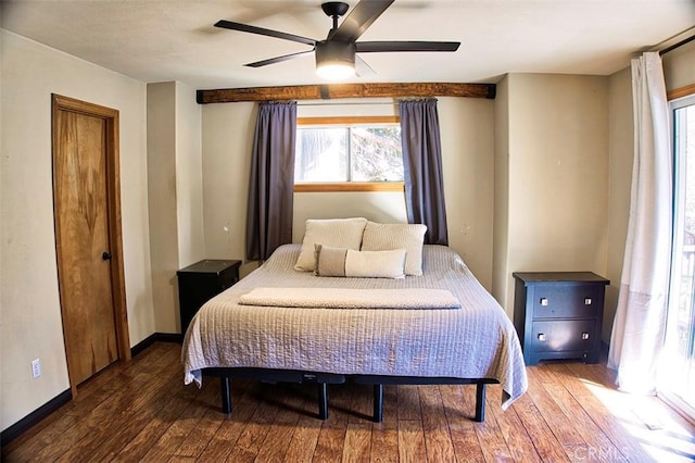 bedroom with hardwood / wood-style floors, baseboards, and ceiling fan