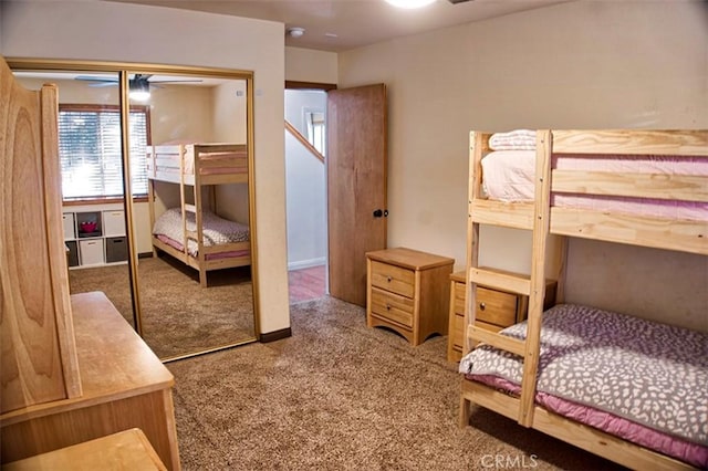 bedroom featuring a closet and carpet