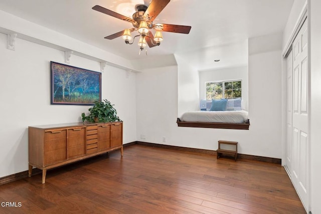12617 Koenigstein Rd, Santa Paula, CA 93060 - interior space with baseboards, dark wood-style flooring, a closet, and a ceiling fan