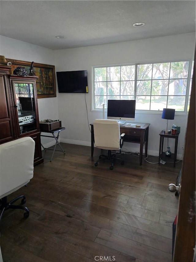 home office featuring baseboards, dark wood-style flooring, and recessed lighting