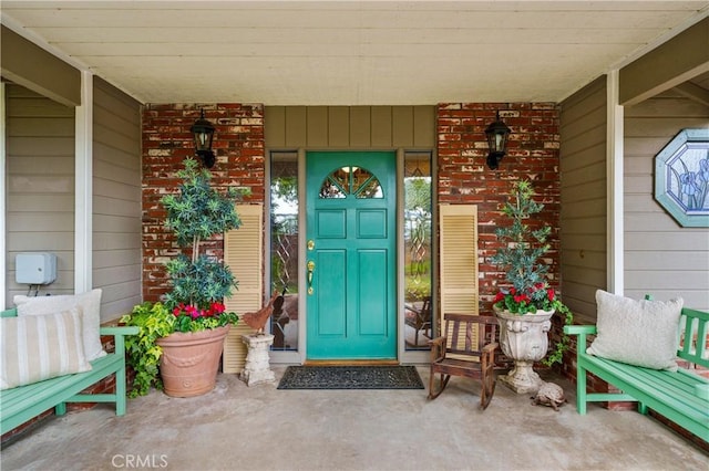 31065 Avenida Del Reposo, Temecula, CA 92591 - view of exterior entry with a porch and brick siding