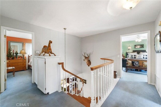 31065 Avenida Del Reposo, Temecula, CA 92591 - hallway with carpet and an upstairs landing