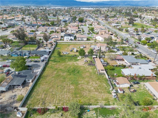 bird's eye view with a residential view and a mountain view