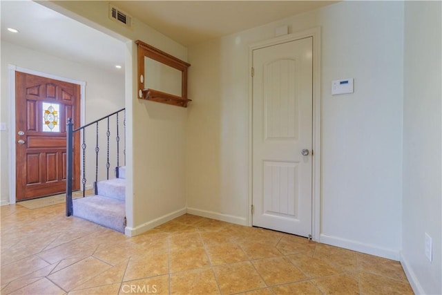 9408 Poplar Ave, Fontana, CA 92335 - entryway featuring baseboards, stairway, and recessed lighting