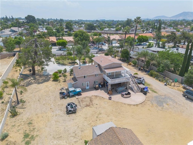 9408 Poplar Ave, Fontana, CA 92335 - aerial perspective of suburban area featuring a mountain backdrop