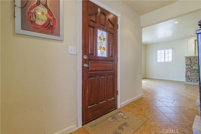 9408 Poplar Ave, Fontana, CA 92335 - tiled foyer entrance with baseboards and recessed lighting