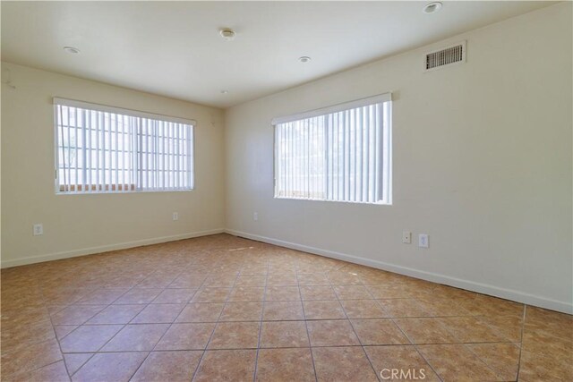 9408 Poplar Ave, Fontana, CA 92335 - unfurnished room featuring tile patterned flooring, baseboards, and a smoke detector