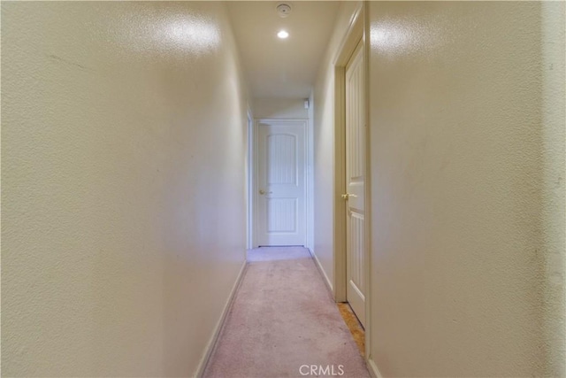 9408 Poplar Ave, Fontana, CA 92335 - corridor with light carpet, baseboards, and recessed lighting
