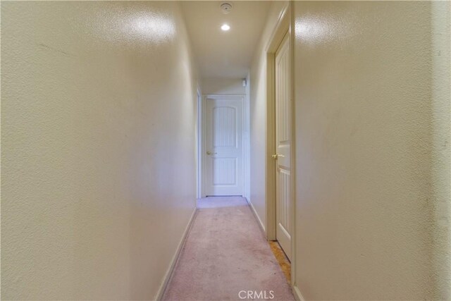 9408 Poplar Ave, Fontana, CA 92335 - corridor with light carpet, baseboards, and recessed lighting
