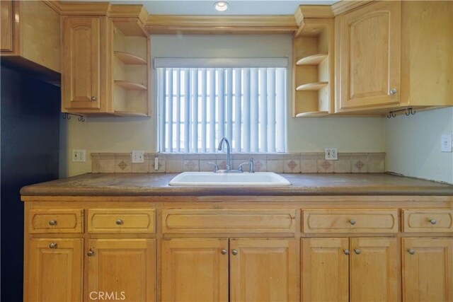 9408 Poplar Ave, Fontana, CA 92335 - kitchen with a sink, open shelves, light brown cabinets, and freestanding refrigerator