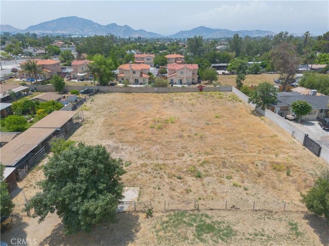 9408 Poplar Ave, Fontana, CA 92335 - aerial perspective of suburban area featuring a mountain backdrop