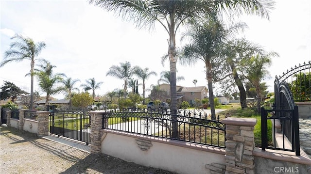 9408 Poplar Ave, Fontana, CA 92335 - gate featuring a residential view