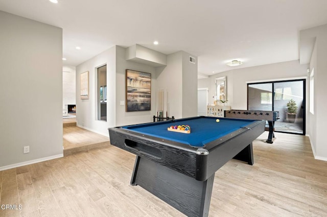 rec room with light wood finished floors, baseboards, billiards, and visible vents