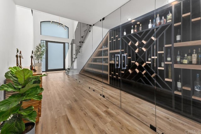 wine room with wood finished floors
