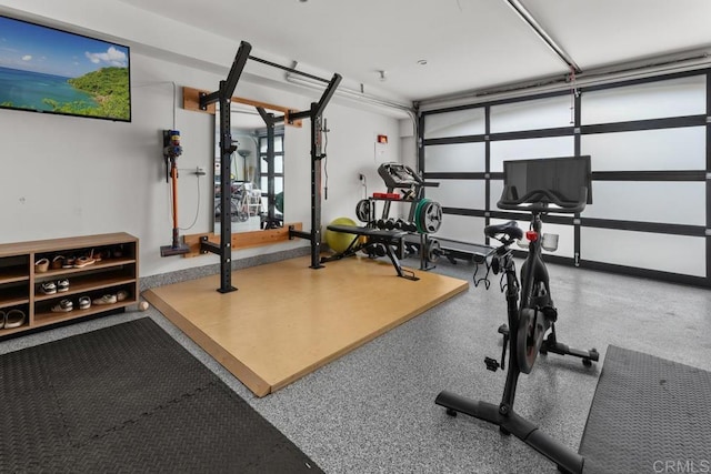 exercise area featuring a garage