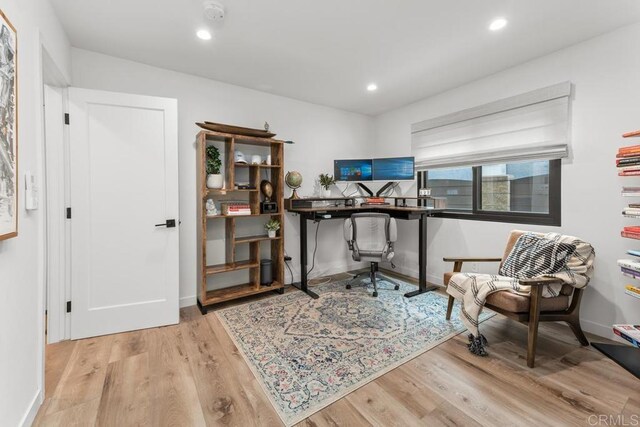 5186 Maynard St, San Diego, CA 92122 - office featuring wood finished floors and recessed lighting