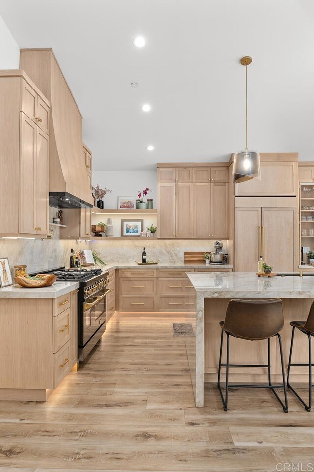 5186 Maynard St, San Diego, CA 92122 - kitchen with light brown cabinets, high end appliances, open shelves, a kitchen breakfast bar, and backsplash