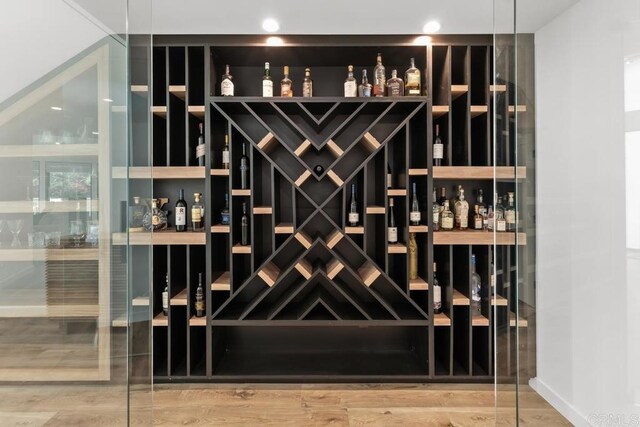 5186 Maynard St, San Diego, CA 92122 - wine cellar with wood finished floors