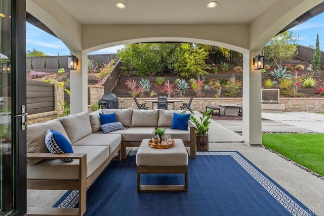 5186 Maynard St, San Diego, CA 92122 - fenced backyard featuring outdoor lounge area, a patio area, and grilling area