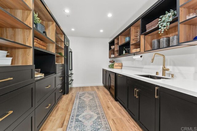 5186 Maynard St, San Diego, CA 92122 - bar area with light wood-style flooring, recessed lighting, and freestanding refrigerator