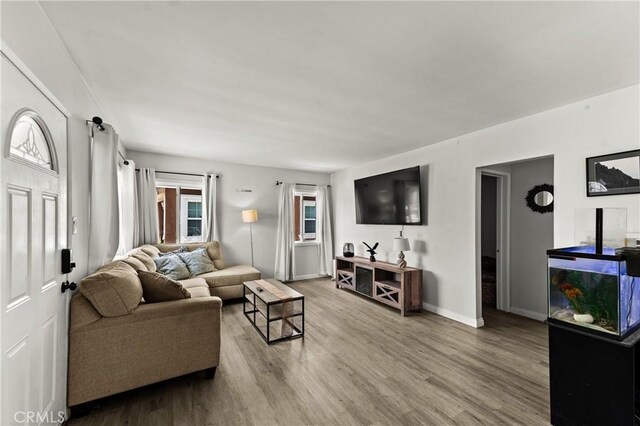 11525 Corby Ave, Norwalk, CA 90650 - living room with wood finished floors and baseboards