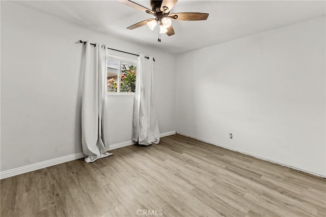 11525 Corby Ave, Norwalk, CA 90650 - spare room featuring light wood-style flooring, a ceiling fan, and baseboards