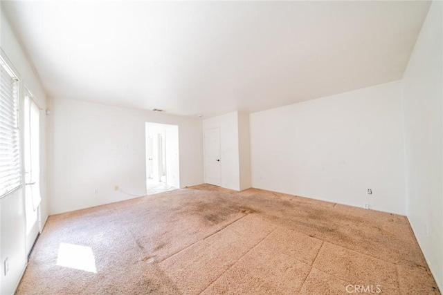 unfurnished room with carpet