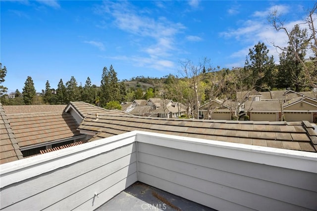 view of patio / terrace with a balcony and a residential view