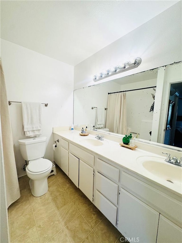 1775 Ohio Ave Unit 213, Long Beach, CA 90804 - full bath featuring toilet, double vanity, and a sink