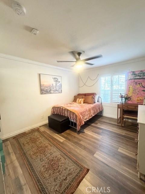 1775 Ohio Ave Unit 213, Long Beach, CA 90804 - bedroom with baseboards, wood finished floors, ceiling fan, and crown molding