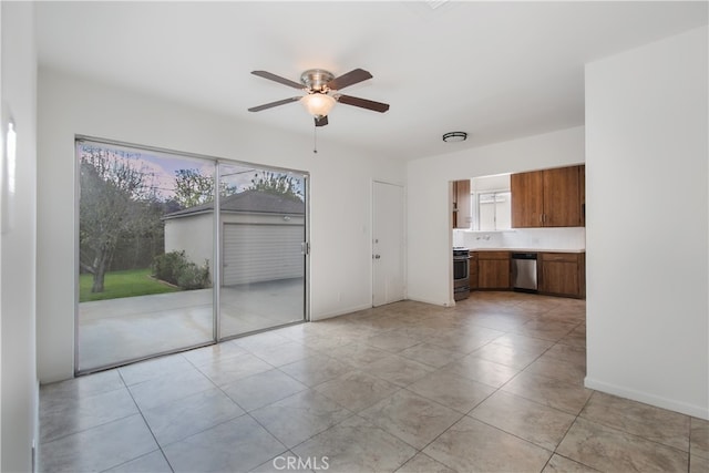 interior space featuring light tile patterned floors, baseboards, and ceiling fan