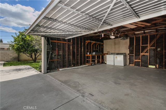 garage featuring washer and dryer