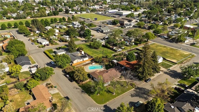 birds eye view of property with a residential view