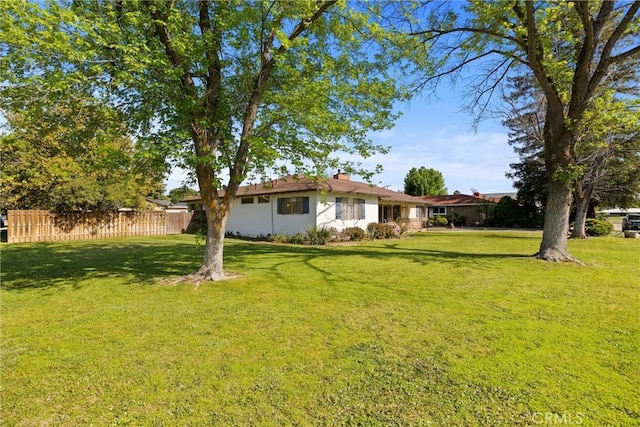 view of yard with fence