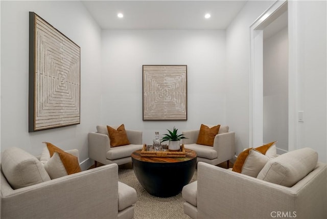 living room featuring carpet floors and recessed lighting