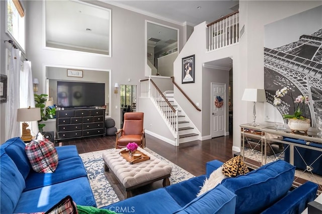 27705 Essex Pl, Valencia, CA 91354 - living room featuring a high ceiling, stairs, wood finished floors, and ornamental molding