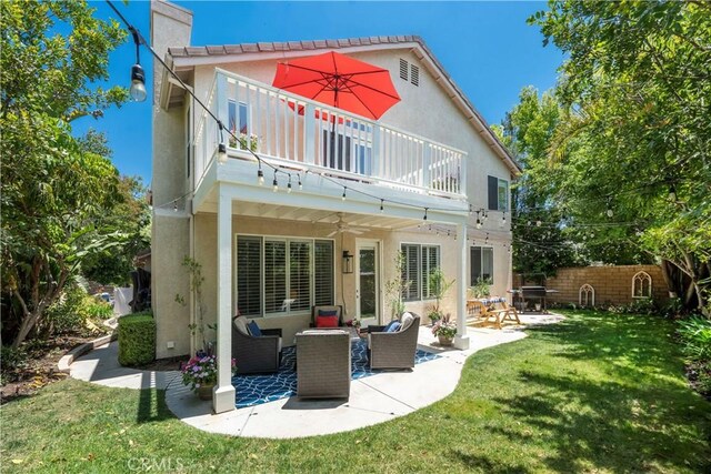 27705 Essex Pl, Valencia, CA 91354 - back of house featuring a balcony, stucco siding, a patio area, and ceiling fan