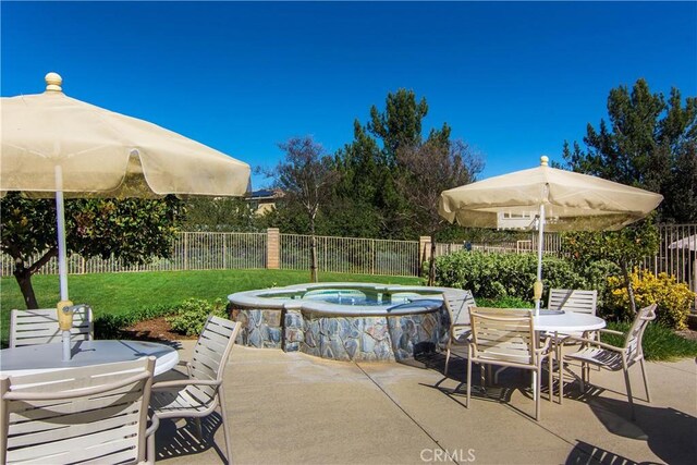 27705 Essex Pl, Valencia, CA 91354 - fenced backyard with an outdoor hot tub, a patio, and outdoor dining area