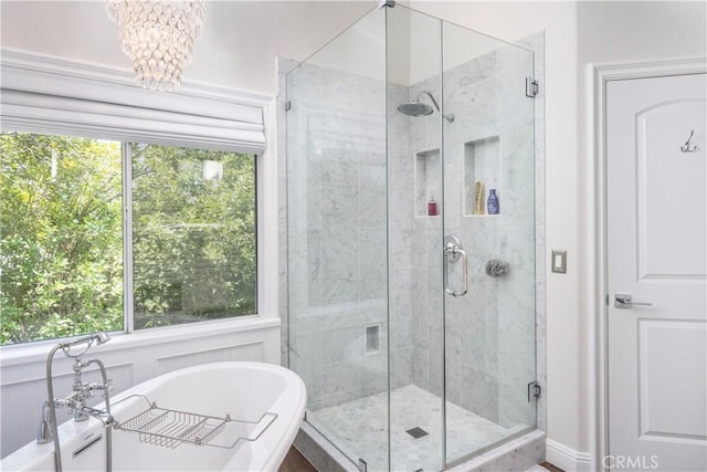 27705 Essex Pl, Valencia, CA 91354 - bathroom featuring a soaking tub, healthy amount of natural light, and a stall shower