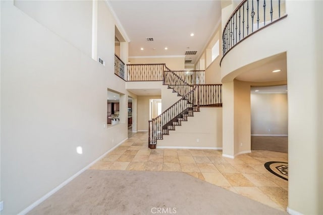36368 Par Ln, Beaumont, CA 92223 - entrance foyer with stairs, a towering ceiling, baseboards, recessed lighting, and tile patterned floors
