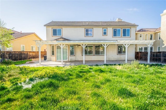 36368 Par Ln, Beaumont, CA 92223 - rear view of property featuring a pergola, a patio, stucco siding, and a fenced backyard