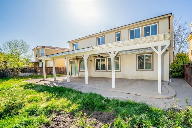 36368 Par Ln, Beaumont, CA 92223 - back of house with a ceiling fan, a pergola, a patio, a fenced backyard, and stucco siding