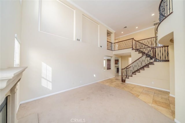 36368 Par Ln, Beaumont, CA 92223 - unfurnished living room featuring stairs, baseboards, plenty of natural light, recessed lighting, and ornamental molding