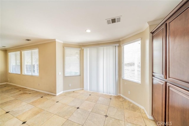 36368 Par Ln, Beaumont, CA 92223 - spare room with crown molding, baseboards, plenty of natural light, and light tile patterned floors