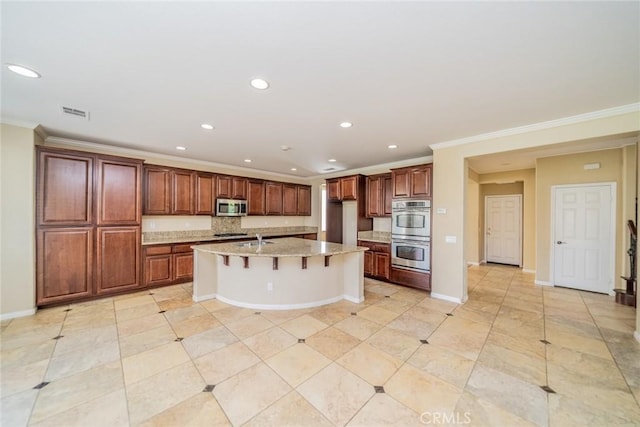 36368 Par Ln, Beaumont, CA 92223 - kitchen featuring stainless steel appliances, ornamental molding, recessed lighting, light stone counters, and a breakfast bar