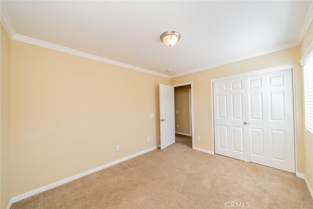 36368 Par Ln, Beaumont, CA 92223 - unfurnished bedroom featuring crown molding, light colored carpet, baseboards, and a closet
