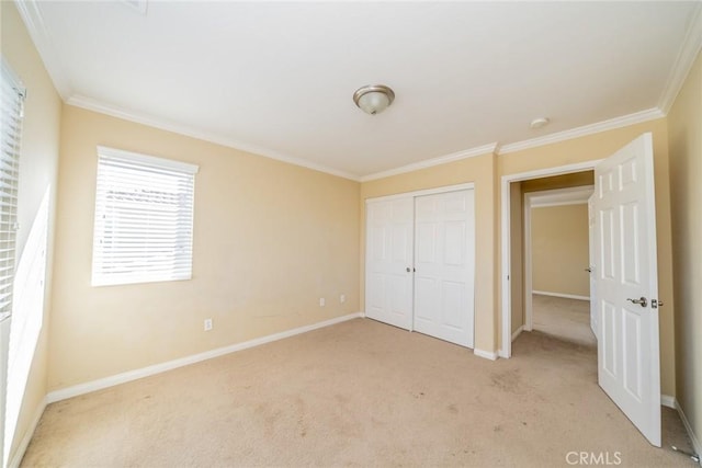 36368 Par Ln, Beaumont, CA 92223 - unfurnished bedroom featuring light colored carpet, ornamental molding, a closet, and baseboards