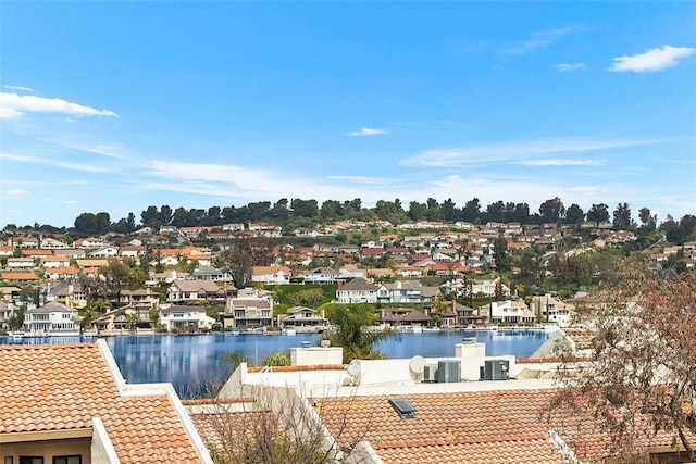 27869 Mazagon Unit 111, Mission Viejo, CA 92692 - view of swimming pool with a residential view, a water view, and central AC unit
