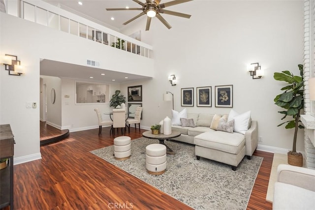27869 Mazagon Unit 111, Mission Viejo, CA 92692 - living area featuring ceiling fan, wood finished floors, baseboards, a towering ceiling, and recessed lighting